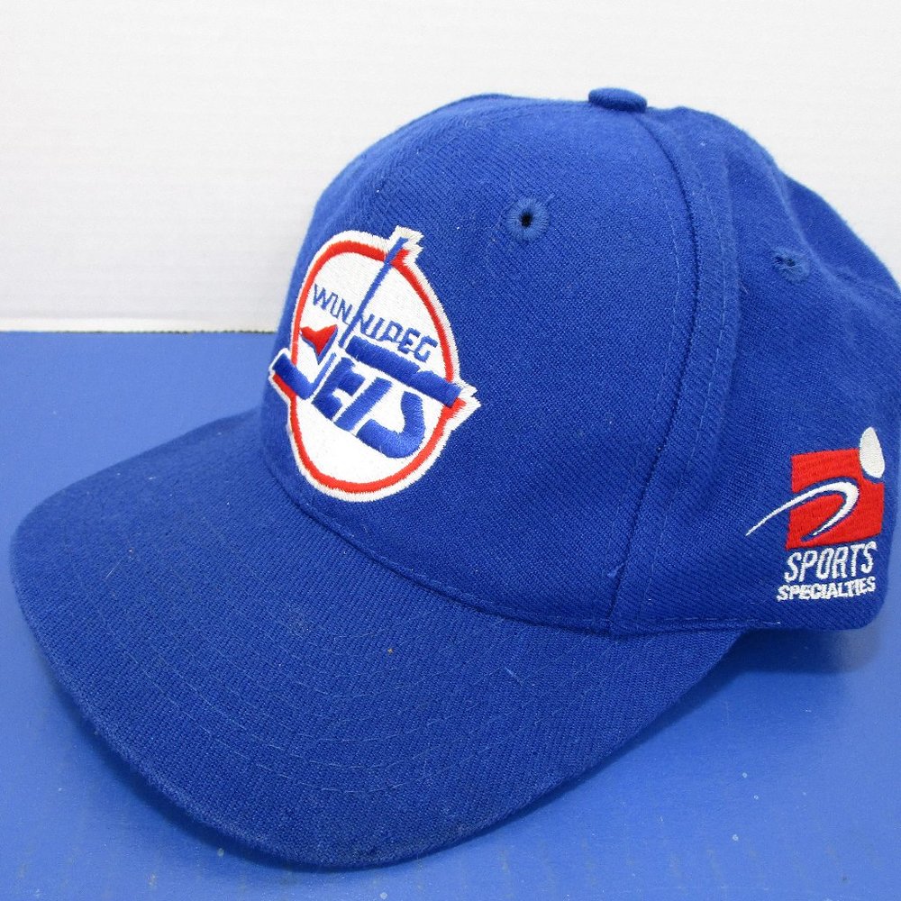 Vintage Winnipeg Jets. Authentic Center Ice Collection. Blue embroidered logo.
